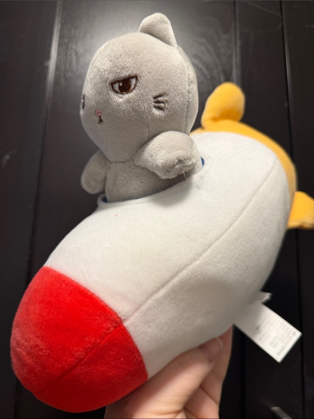 Miniso Rocket Cat Gray Plush Toy on White and Red Rocket